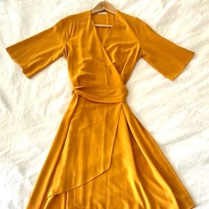 Bimani Gold Wrap Midi Dress with Tie Front and Plunge Neckline